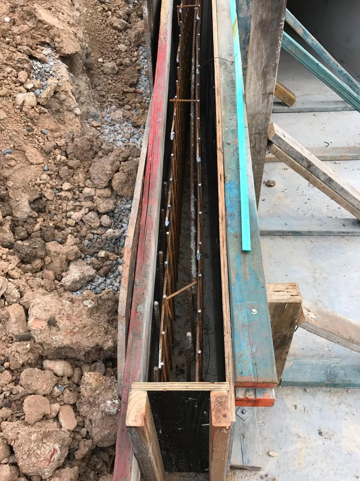 Strip footing formwork and reinforcement in a rocky trench